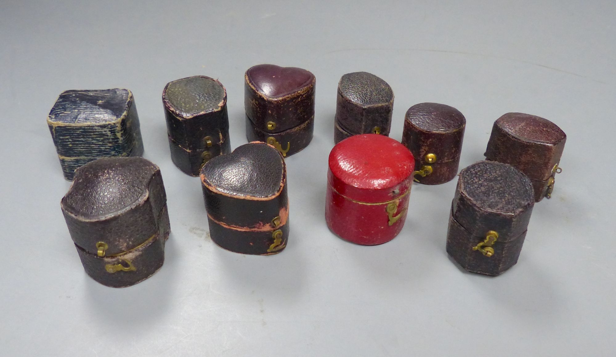 Ten assorted antique ring boxes.